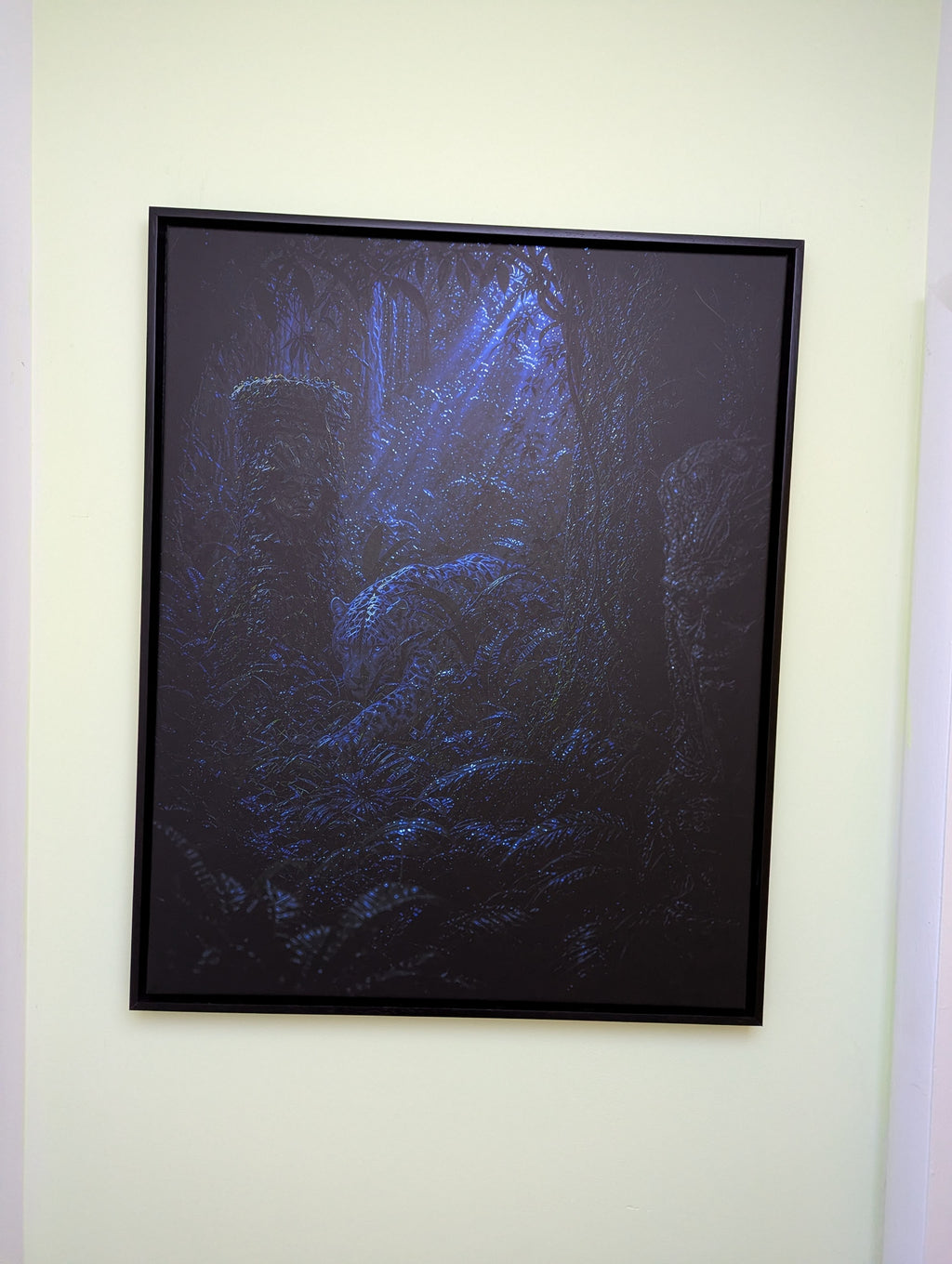 Veilith Midnight Edition — dark light-reactive canvas, guardian revealed under directional light